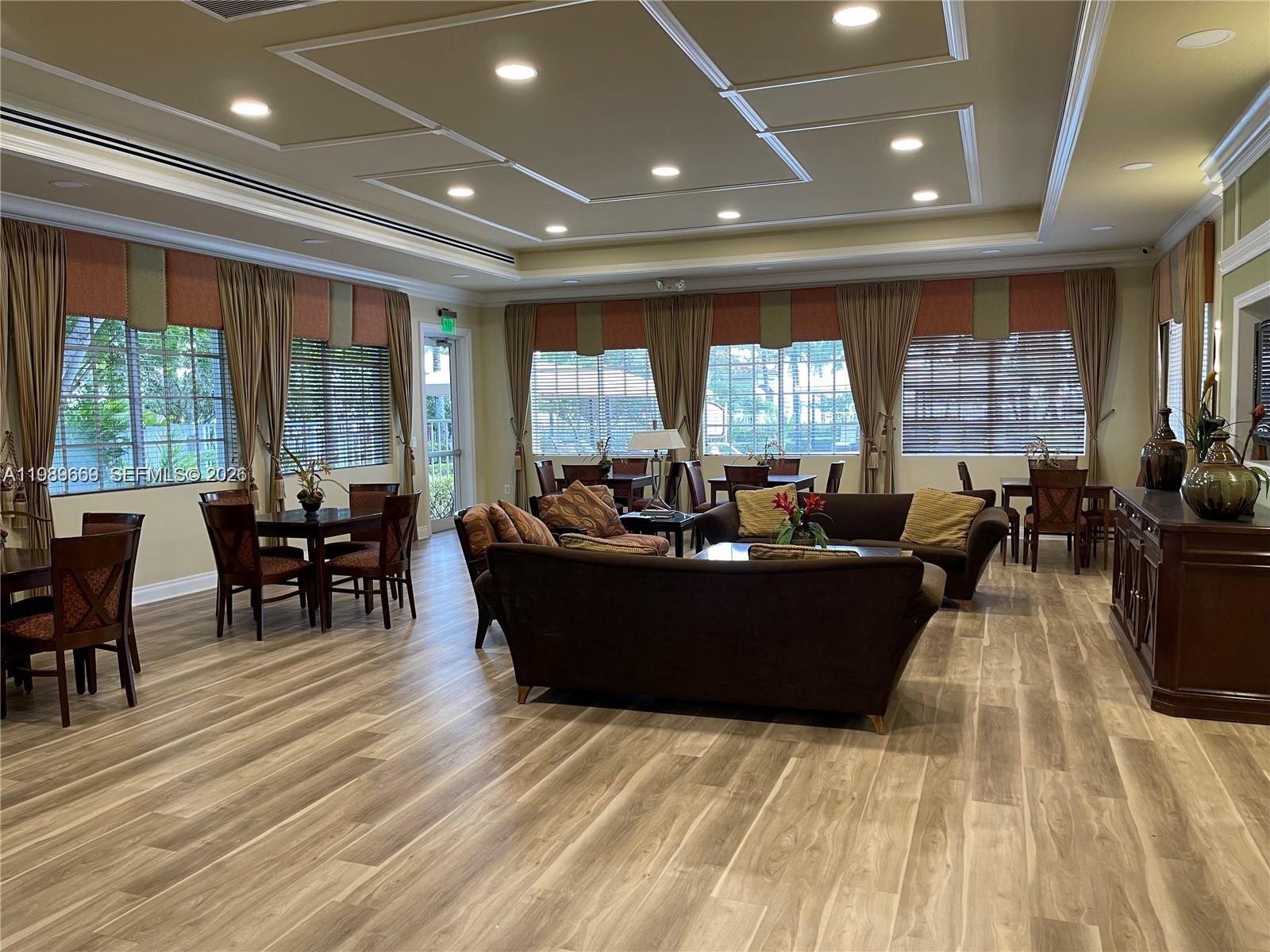 17713 Southwest 47th Street Miramar, FL 33029 - Photo 88 of 94 a living room with furniture and large windows