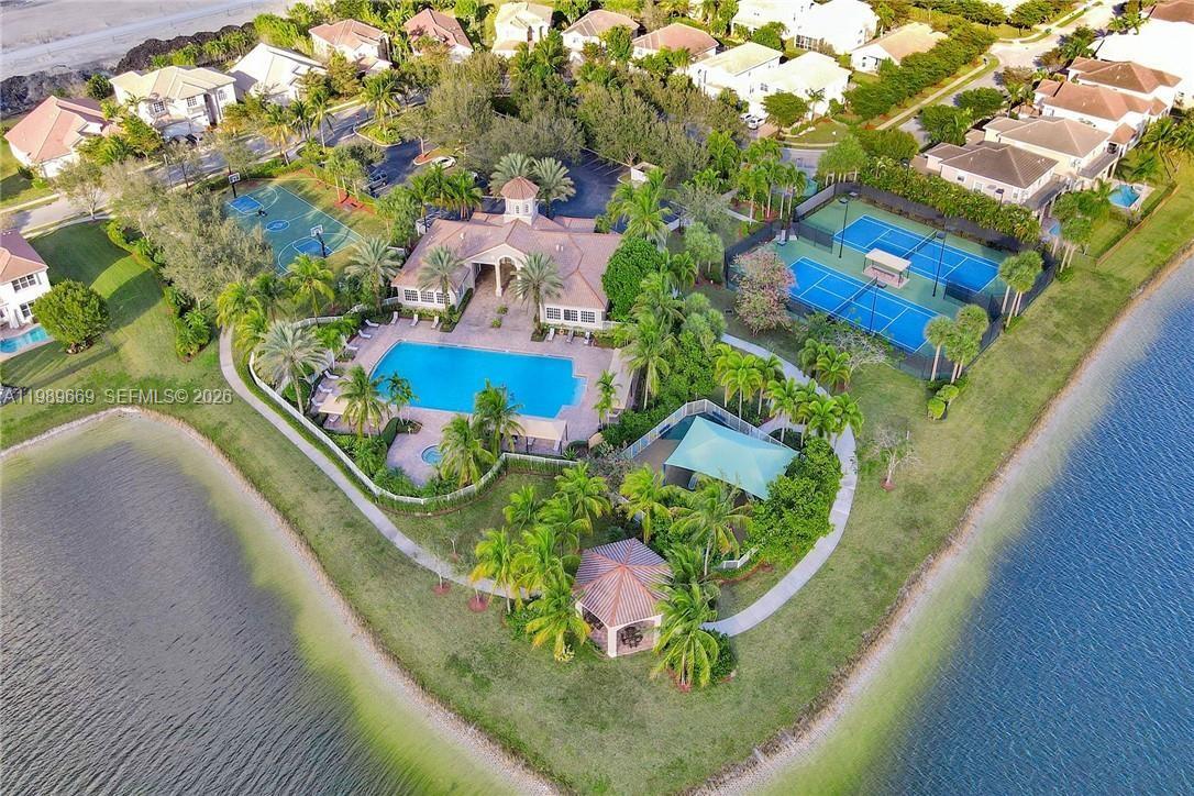 17713 Southwest 47th Street Miramar, FL 33029 - Photo 94 of 94 a view of a swimming pool with a yard