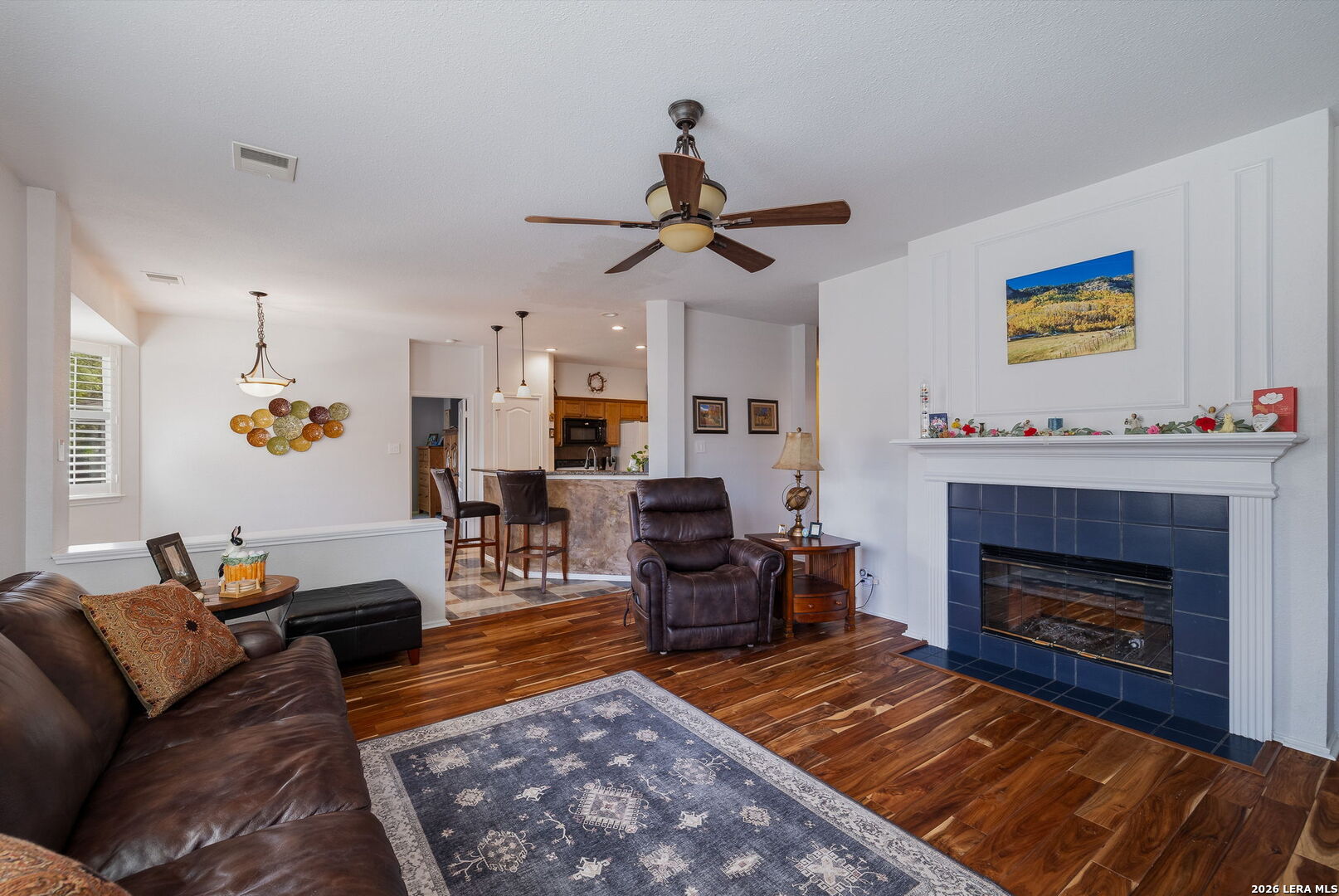 229 Notch Leaf Cibolo, TX 78108 - Photo 11 of 30 a living room with furniture and a fireplace