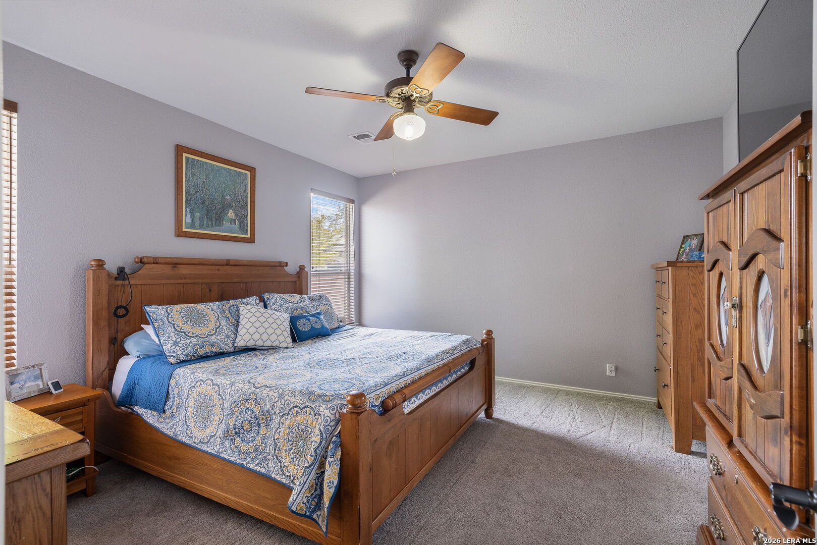 229 Notch Leaf Cibolo, TX 78108 - Photo 20 of 30 a bedroom with a bed and a chandelier