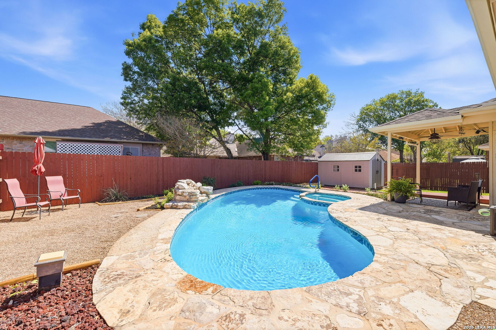 229 Notch Leaf Cibolo, TX 78108 - Photo 25 of 30 a view of a swimming pool with an outdoor space and seating area