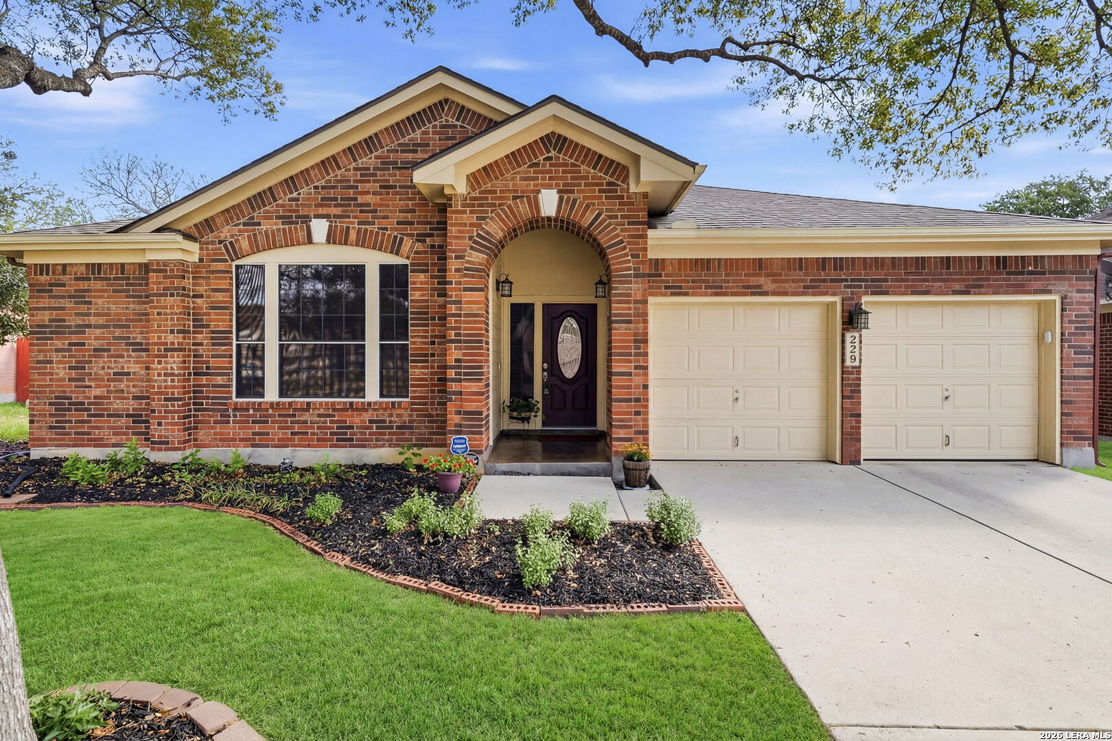 229 Notch Leaf Cibolo, TX 78108 - Photo 3 of 30 a front view of a house with garden
