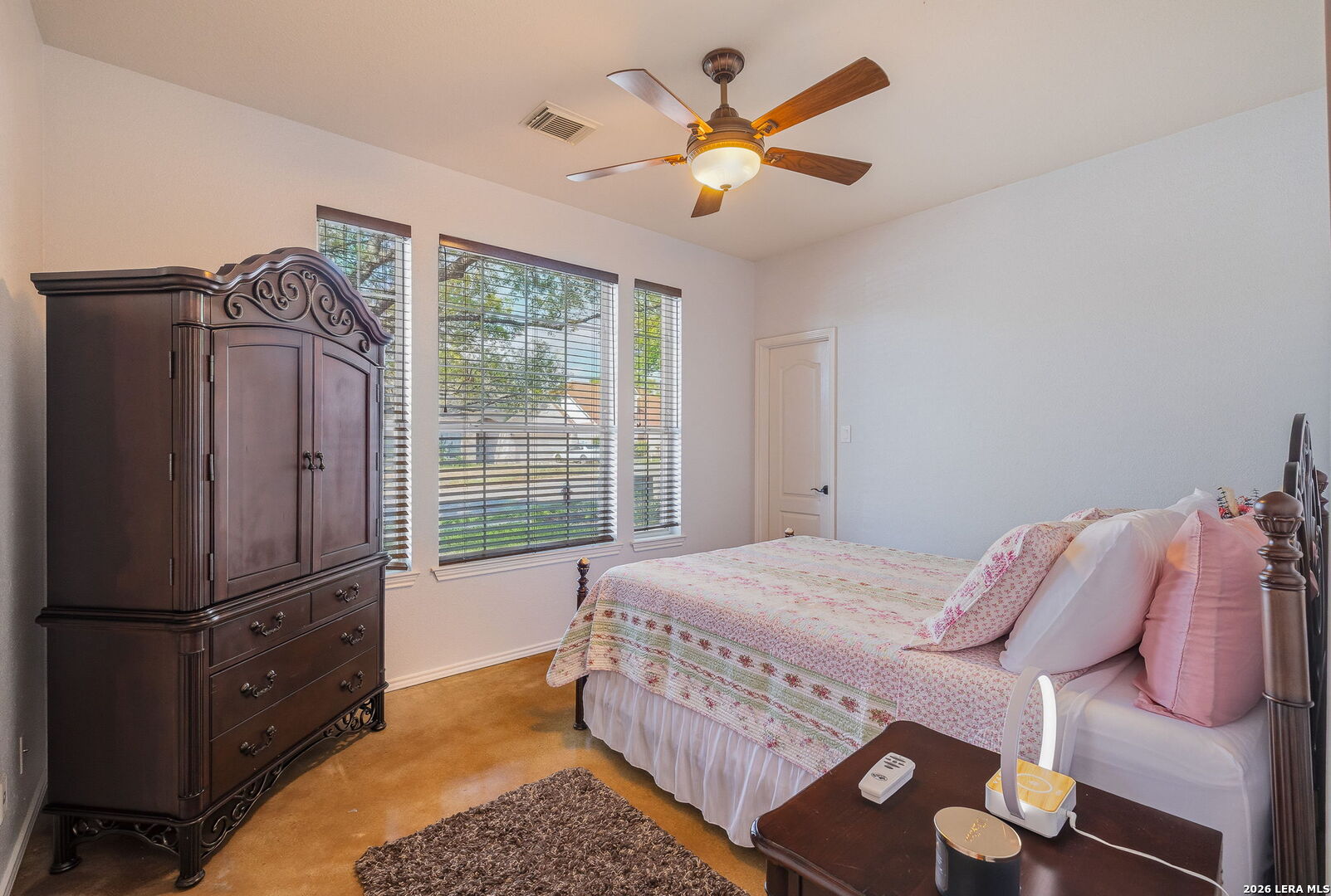 229 Notch Leaf Cibolo, TX 78108 - Photo 6 of 30 a bedroom with a bed dresser and a window
