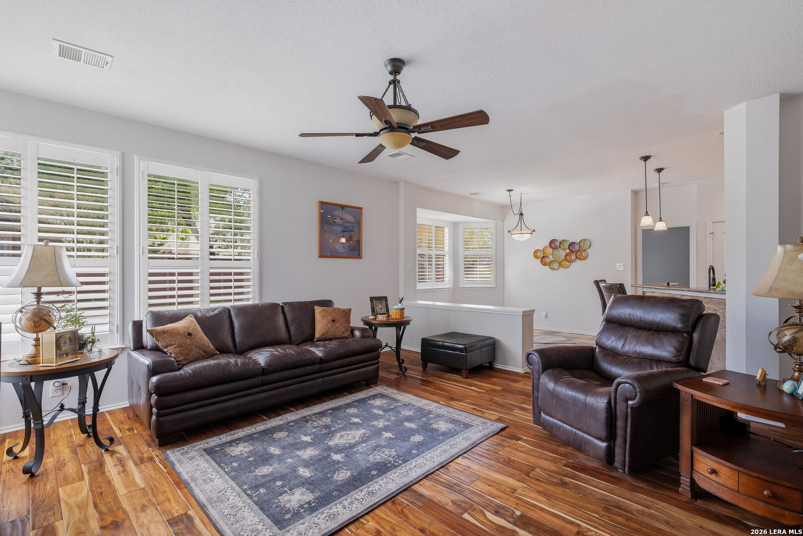 229 Notch Leaf Cibolo, TX 78108 - Photo 10 of 30 a living room with furniture a flat screen tv and a window
