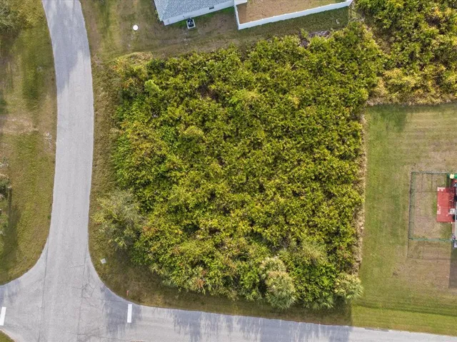 a view of a swimming pool and an outdoor space
