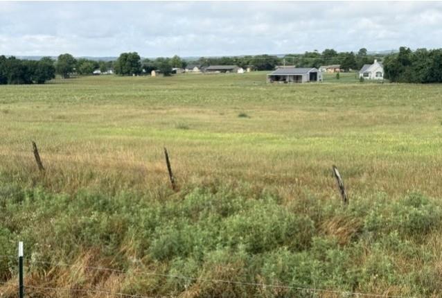 Tbd East 9th Street Springtown, TX 76082 - Photo 6 of 7 a view of a lake with houses in the background