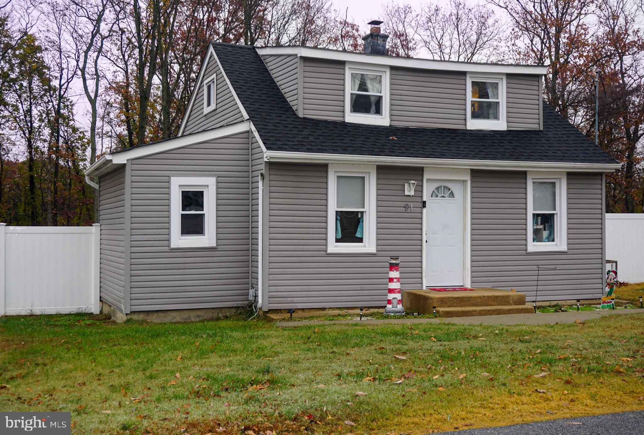 91 Mt Clement Avenue Pine Hill, NJ 08021 - Photo 1 of 27 a front view of a house with a yard