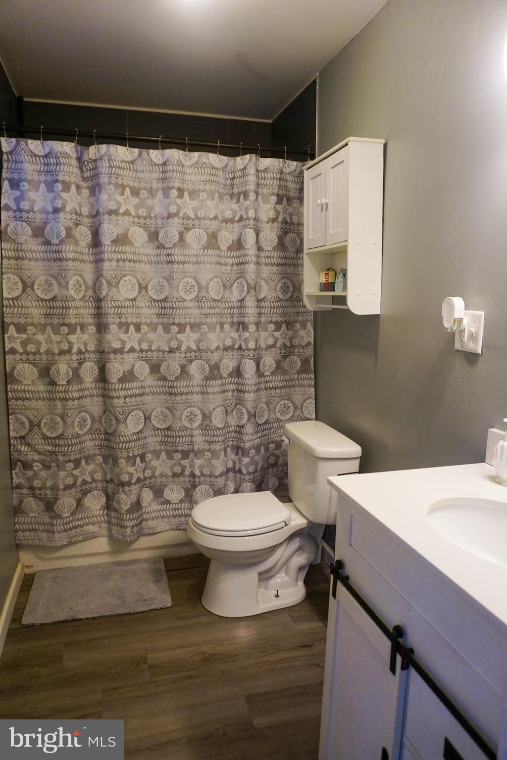 91 Mt Clement Avenue Pine Hill, NJ 08021 - Photo 16 of 27 a bathroom with a sink a toilet and shower