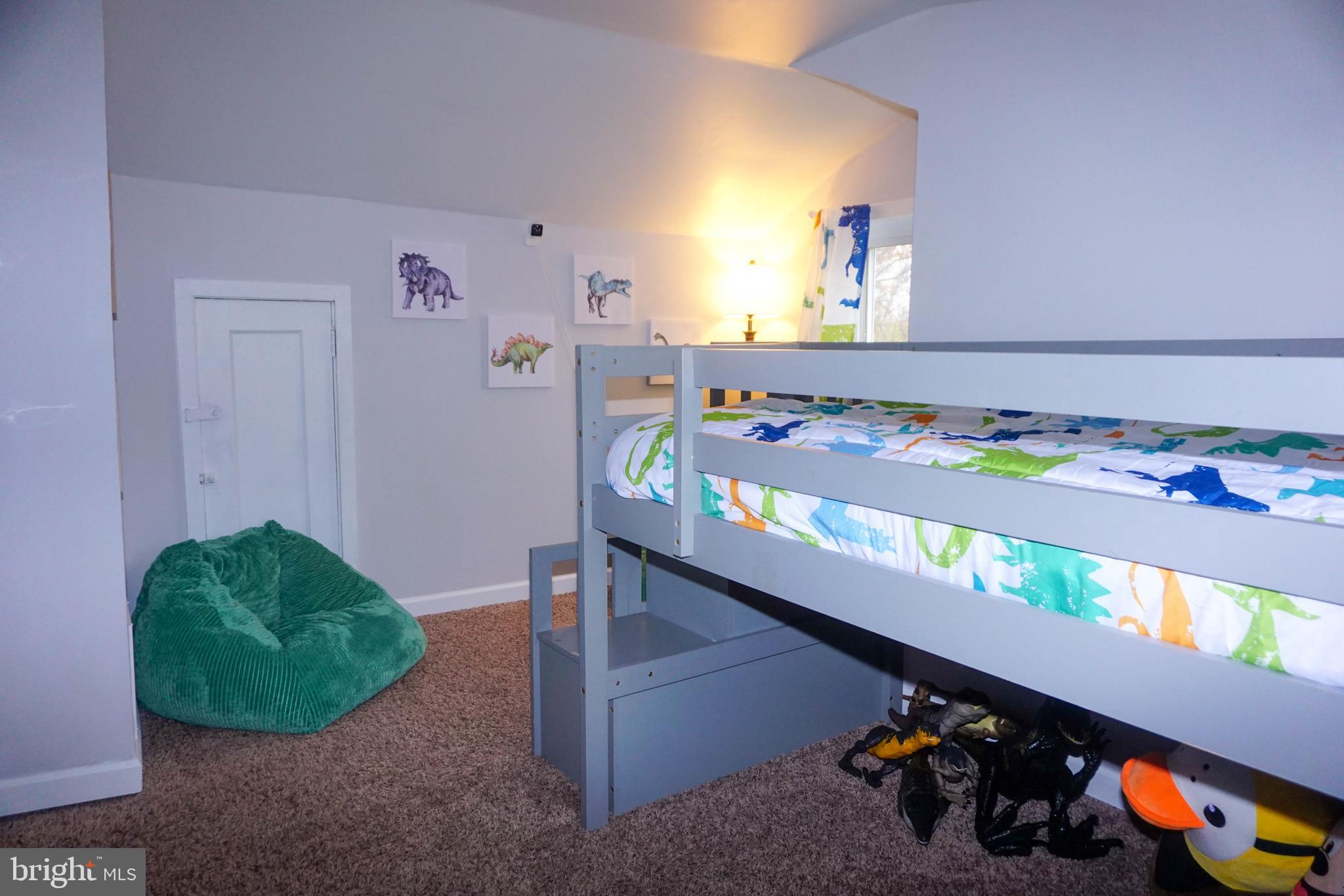 91 Mt Clement Avenue Pine Hill, NJ 08021 - Photo 19 of 27 a hallway with a soccer table and a couch