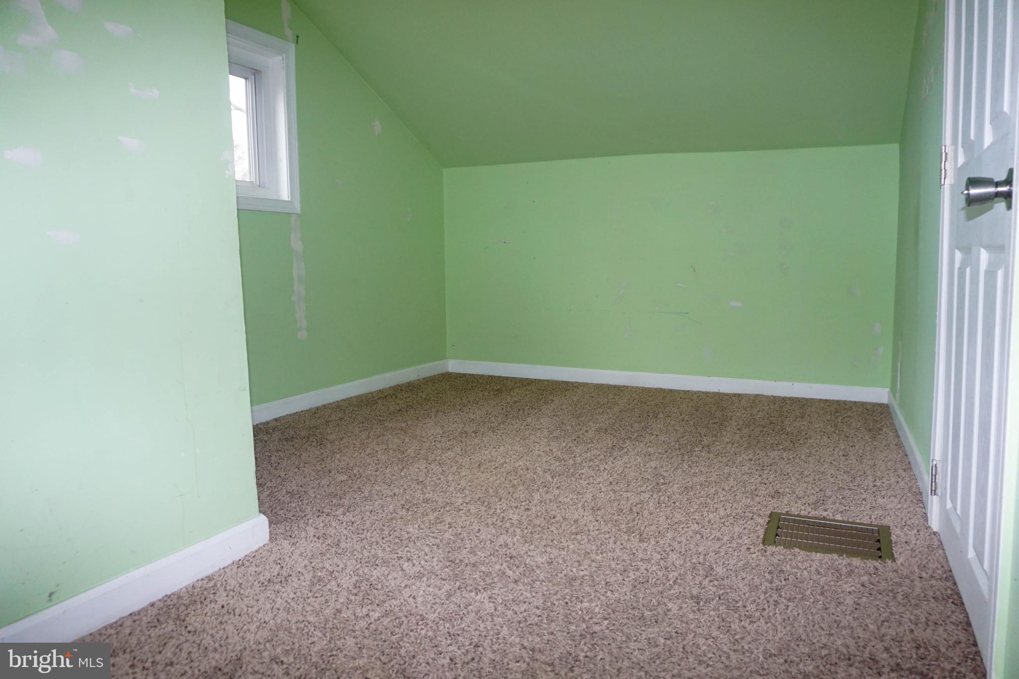 91 Mt Clement Avenue Pine Hill, NJ 08021 - Photo 25 of 27 an empty room with a window