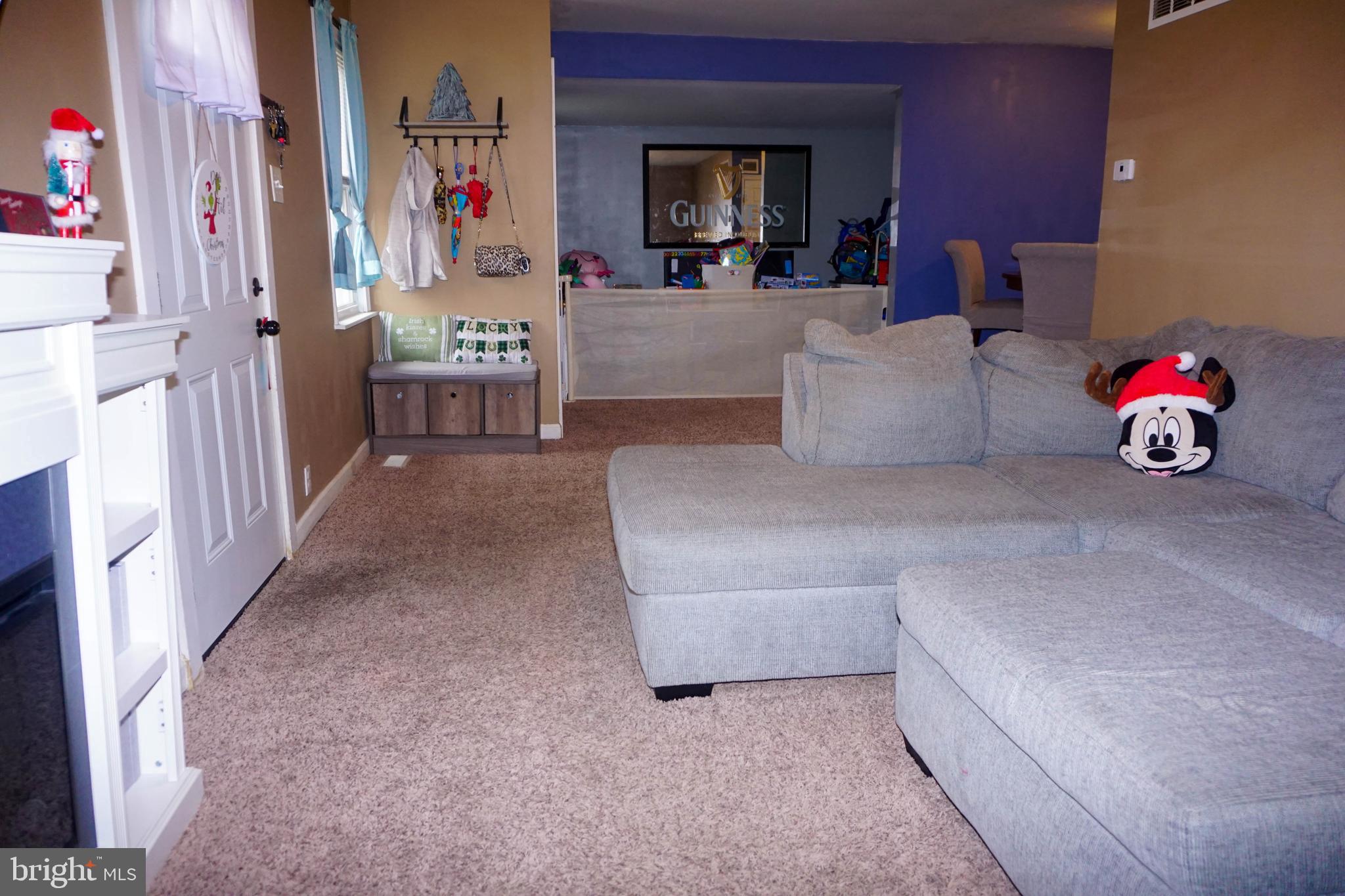 91 Mt Clement Avenue Pine Hill, NJ 08021 - Photo 5 of 27 a living room with furniture and a couch
