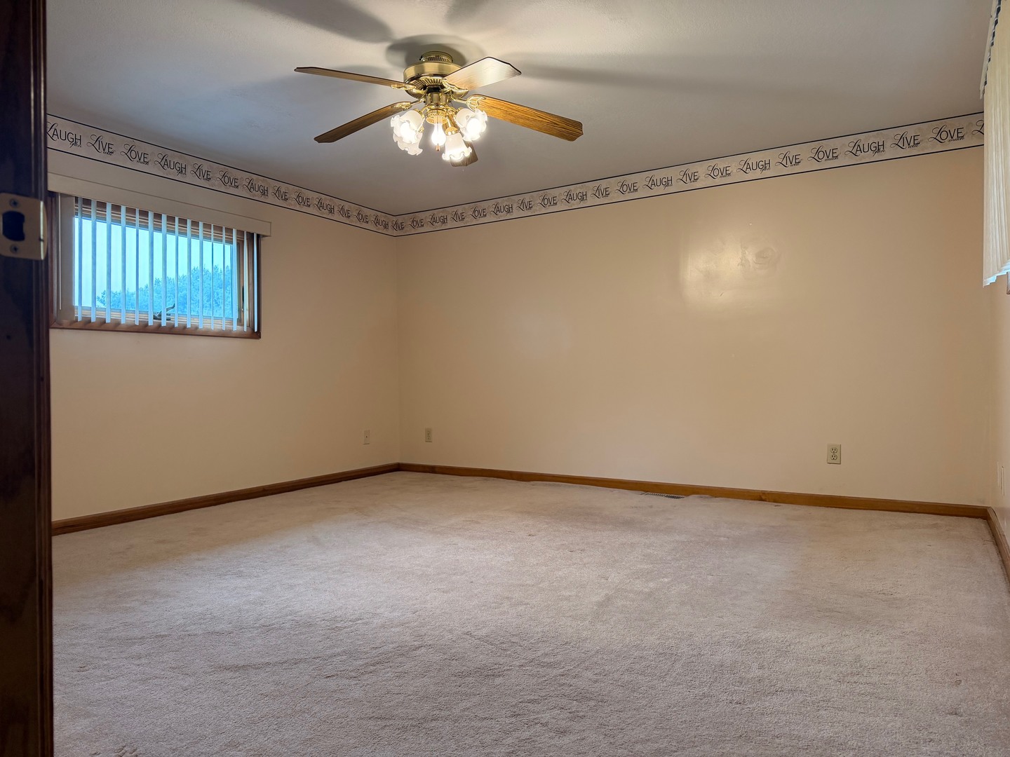 382 Keigwin Road Walnut, IL 61376 - Photo 24 of 49 a view of an empty room with a window