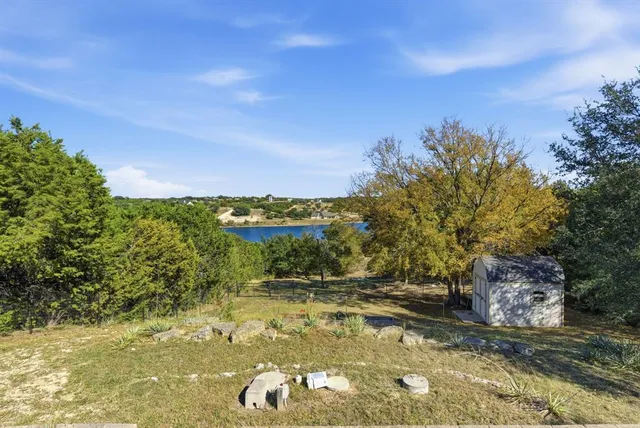 a view of a lake from a yard