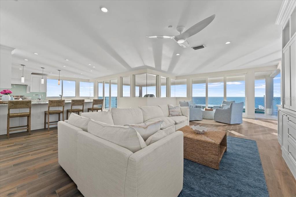 2708 North Beach Road, Unit 5 Englewood, FL 34223 - Photo 13 of 82 a living room with furniture and a wooden floor