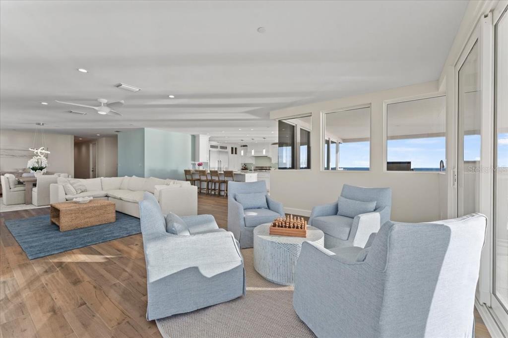 2708 North Beach Road, Unit 5 Englewood, FL 34223 - Photo 20 of 82 a living room with furniture and a large window