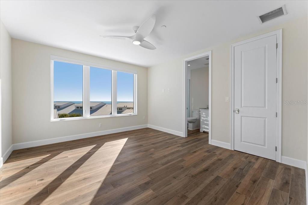 2708 North Beach Road, Unit 5 Englewood, FL 34223 - Photo 63 of 82 a view of an empty room and window