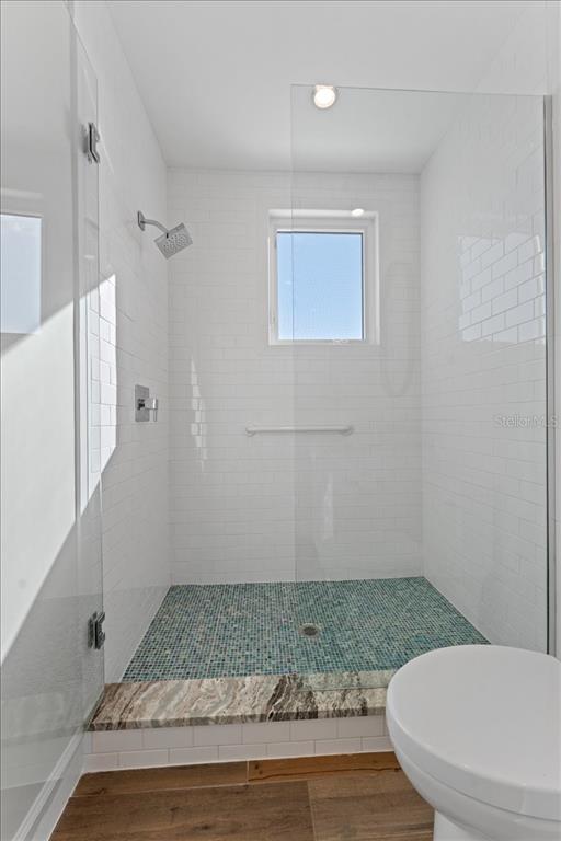2708 North Beach Road, Unit 5 Englewood, FL 34223 - Photo 66 of 82 a bathroom with a toilet and a shower
