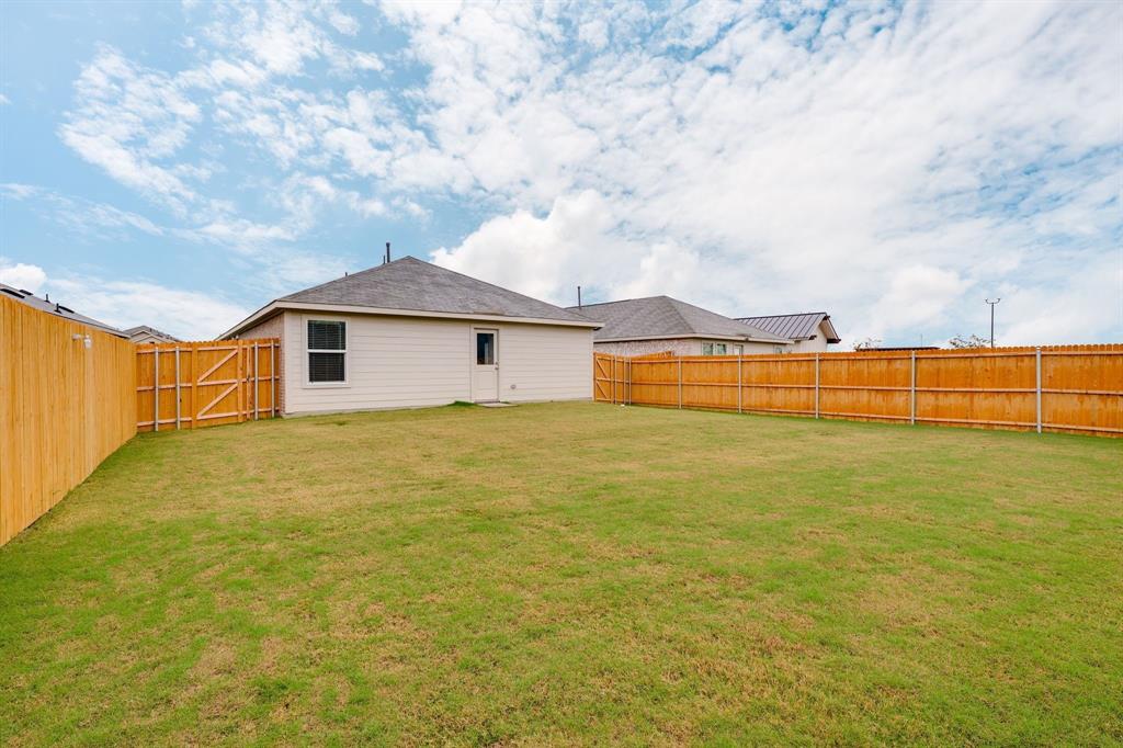 1119 Barbary Flds Street Forney, TX 75126 - Photo 13 of 14 a view of an ocean with a big yard