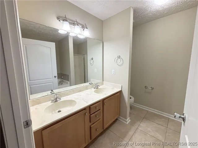 a spacious bathroom with a bathtub
