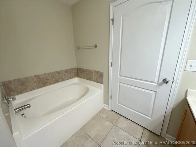 a bathroom with a bathtub
