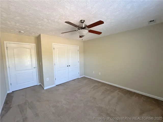 a bathroom with a sink vanity and mirror