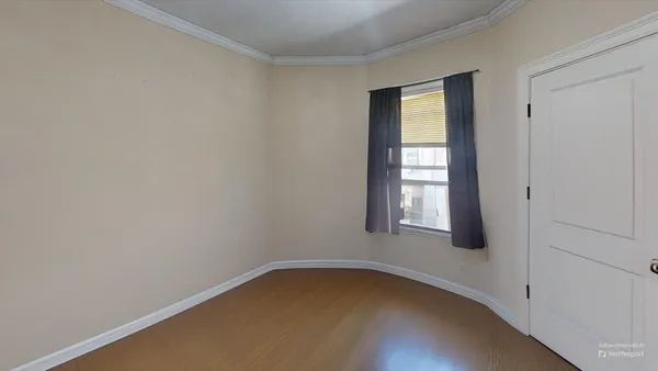 an empty room with a window