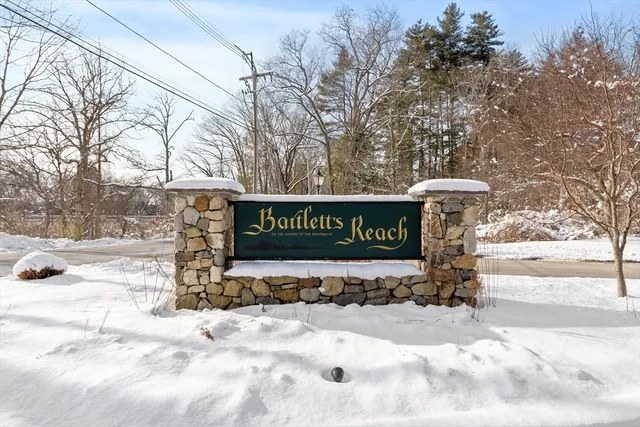 a view of a street sign on a road