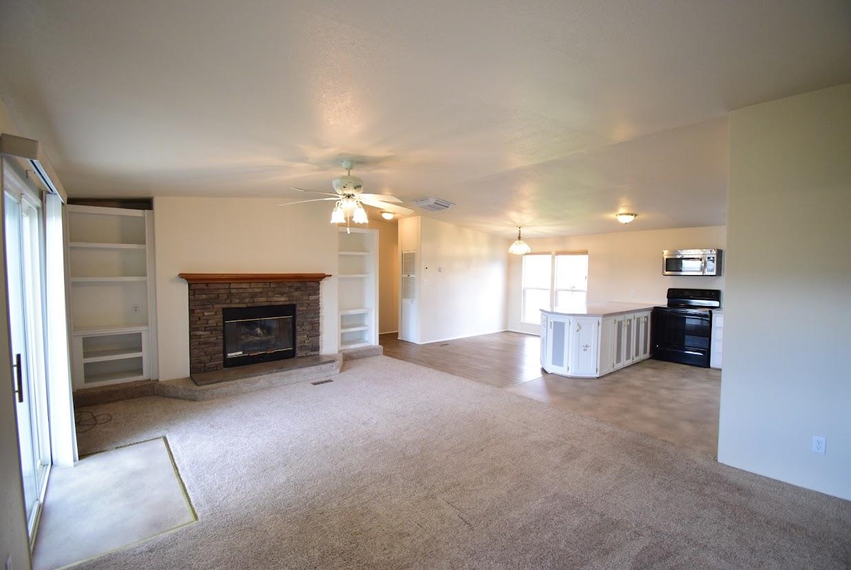 19548 B50 Road Delta, CO 81416 - Photo 10 of 37 a view of a livingroom with a fireplace