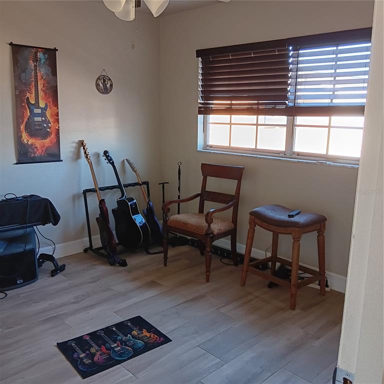 4158 Tamiami Trail, Unit R8 Port Charlotte, FL 33952 - Photo 12 of 29 a view of a workspace with furniture and a window