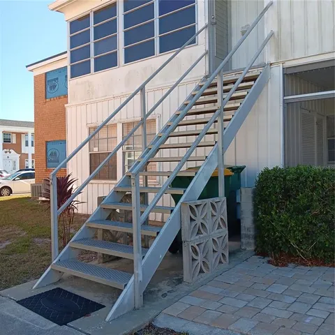 a view of entryway with a front door