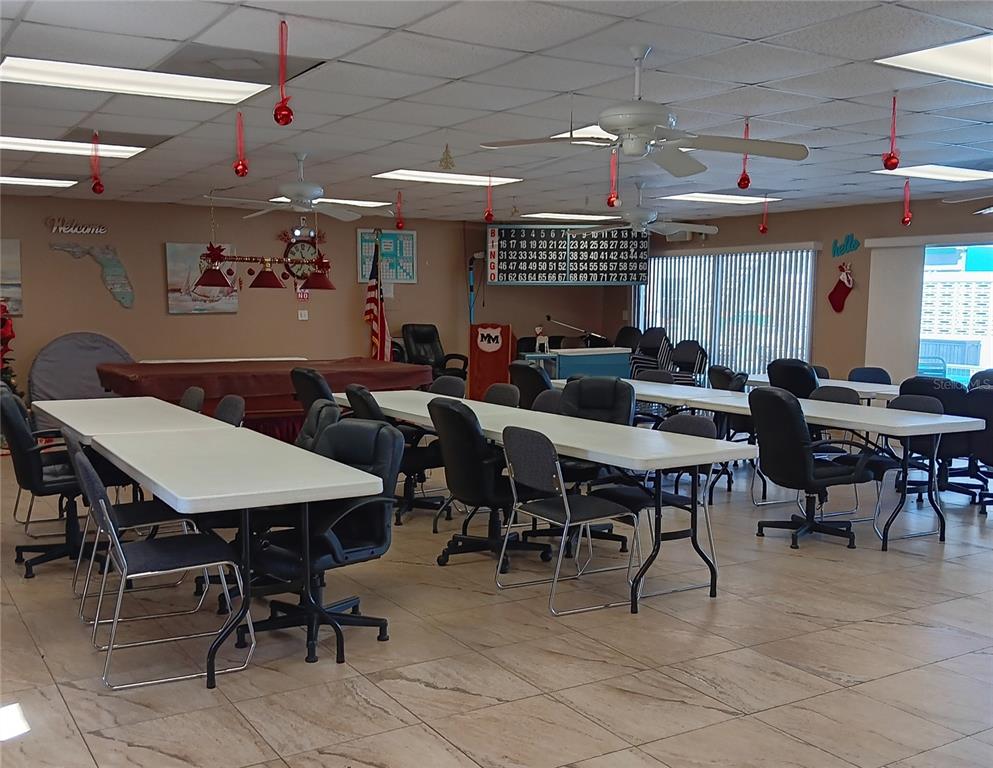 4158 Tamiami Trail, Unit R8 Port Charlotte, FL 33952 - Photo 25 of 29 a view of a dining area with furniture