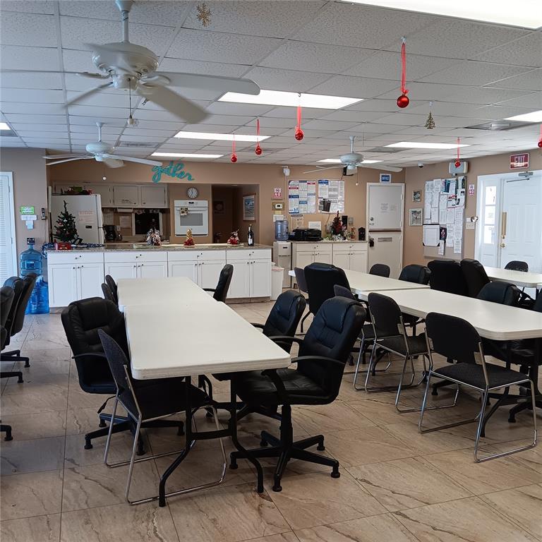 4158 Tamiami Trail, Unit R8 Port Charlotte, FL 33952 - Photo 26 of 29 a view of a dining area with furniture