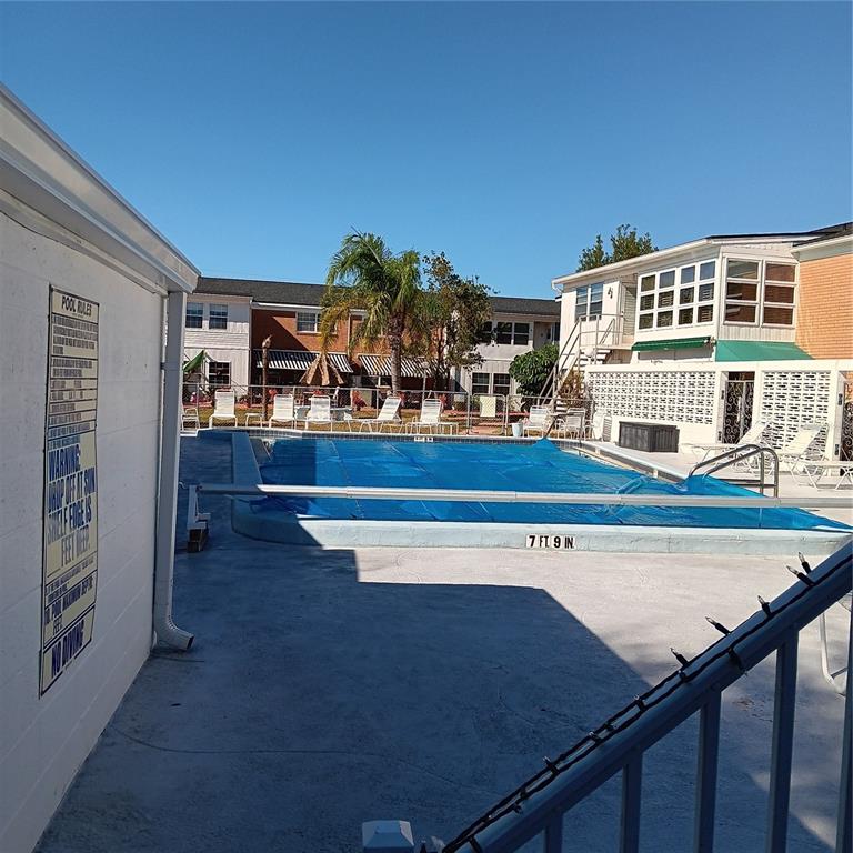 4158 Tamiami Trail, Unit R8 Port Charlotte, FL 33952 - Photo 27 of 29 a view of a living room and kitchen