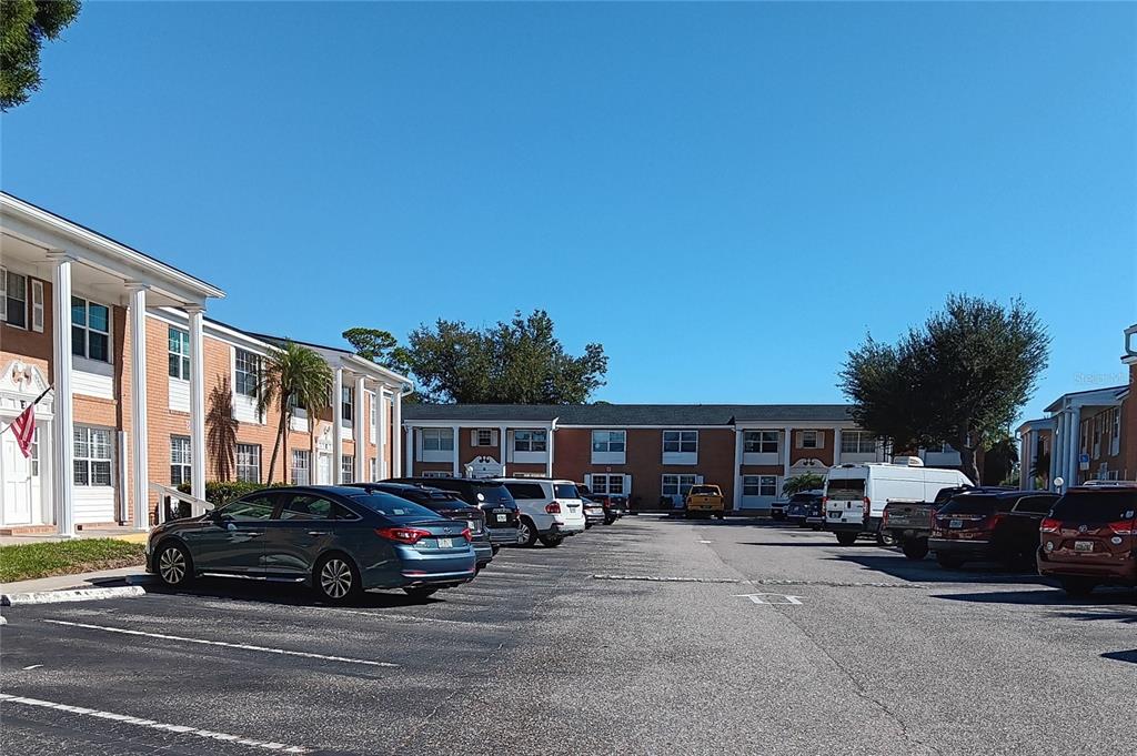 4158 Tamiami Trail, Unit R8 Port Charlotte, FL 33952 - Photo 29 of 29 a view of street with parked cars