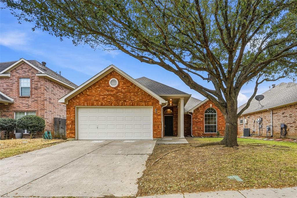 Ranch-style home with an attached garage and fresh exterior paint.