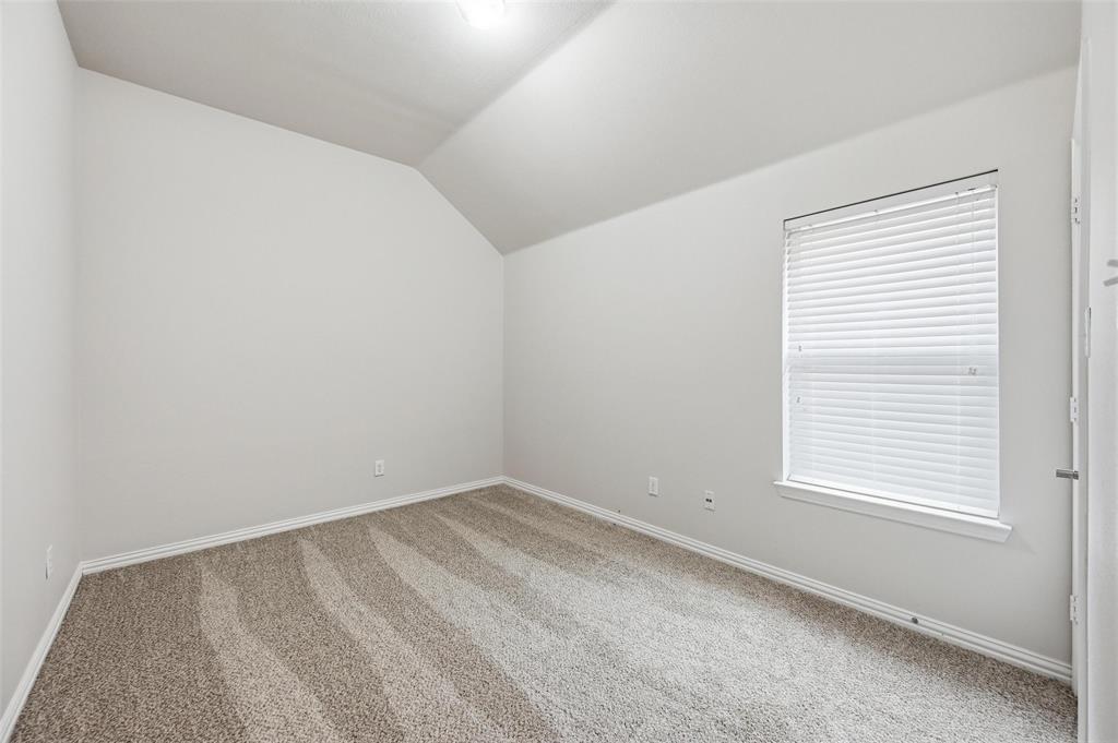 4416 Ridgeway Drive Mansfield, TX 76063 - Photo 22 of 27 Back bedroom with fresh paint and new carpet