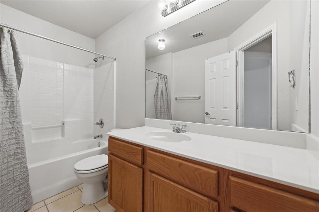 4416 Ridgeway Drive Mansfield, TX 76063 - Photo 24 of 27 Second bath with large vanity