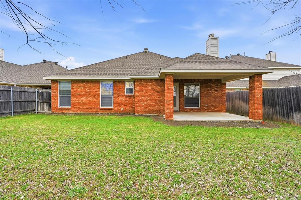 4416 Ridgeway Drive Mansfield, TX 76063 - Photo 26 of 27 Back yard with covered patio