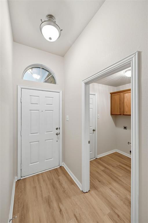 4416 Ridgeway Drive Mansfield, TX 76063 - Photo 3 of 27 Entry leading to laundry room and garage