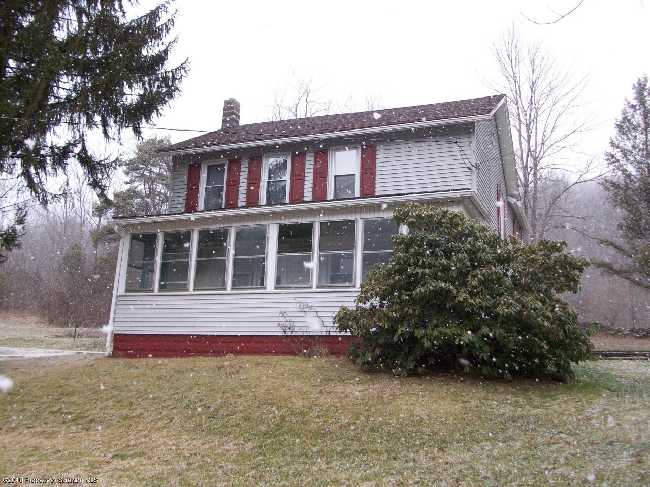 Rr1 Rr1 Hop Bottom, PA 18824 - Photo 1 of 10 a front view of a house with a yard