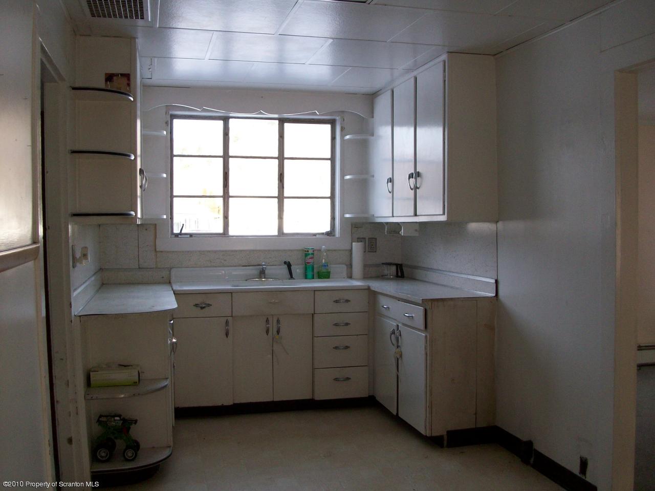 Rr1 Rr1 Hop Bottom, PA 18824 - Photo 8 of 10 a kitchen with a sink cabinets and window