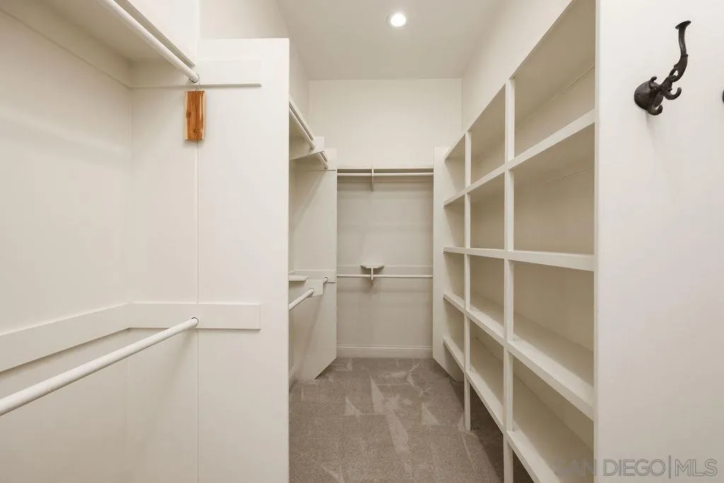 23085 Tombill Road Ramona, CA 92065 - Photo 15 of 43 a view of an empty walk in closet