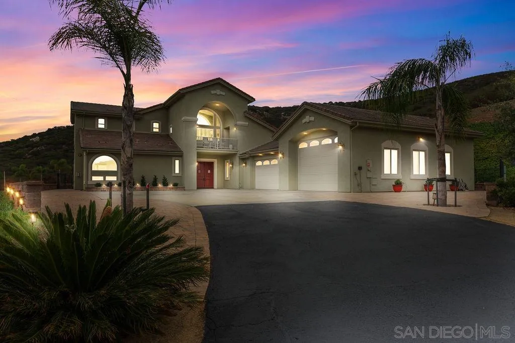 23085 Tombill Road Ramona, CA 92065 - Photo 2 of 43 a front view of a house with a yard