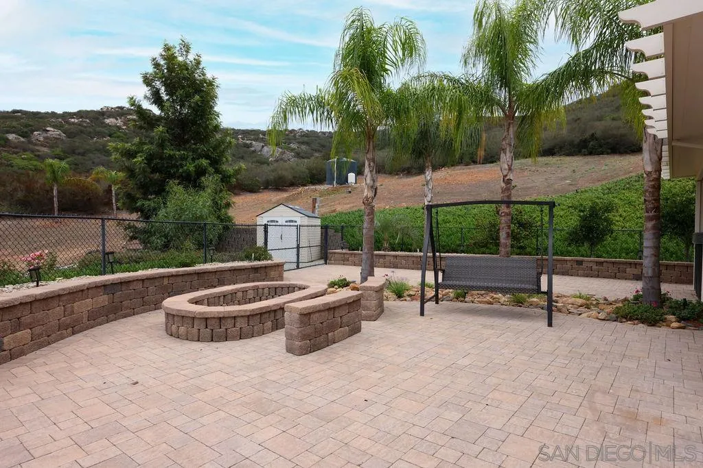23085 Tombill Road Ramona, CA 92065 - Photo 26 of 43 a view of a patio with a patio