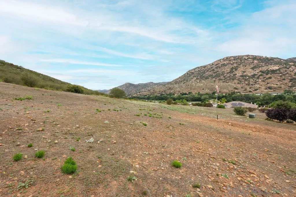 23085 Tombill Road Ramona, CA 92065 - Photo 32 of 43 a view of a large mountain with mountains in the background