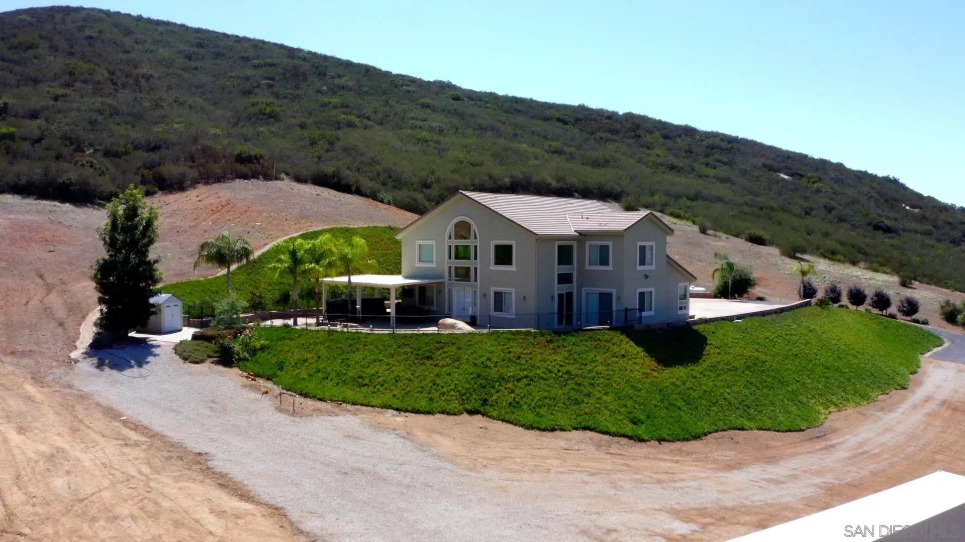 23085 Tombill Road Ramona, CA 92065 - Photo 41 of 43 a view of house with garden and mountain view
