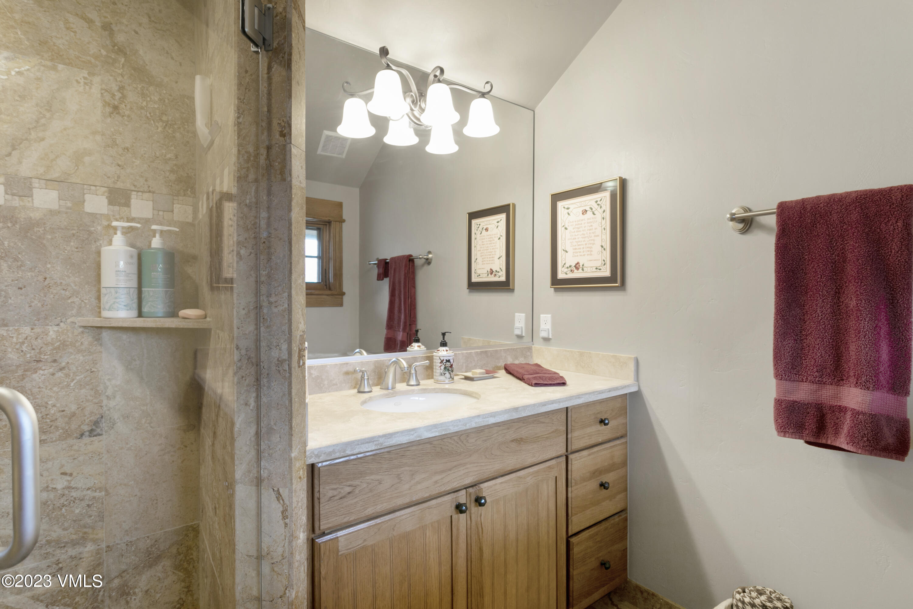 106 East Double Hitch Eagle, CO 81631 - Photo 13 of 28 a bathroom with a sink vanity and a mirror