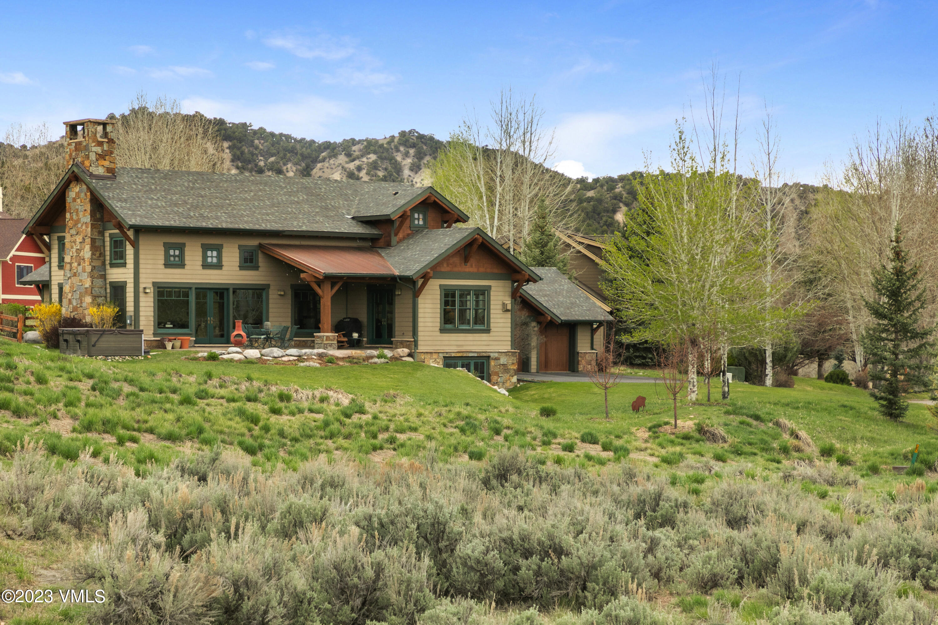 106 East Double Hitch Eagle, CO 81631 - Photo 23 of 28 a front view of a house with garden