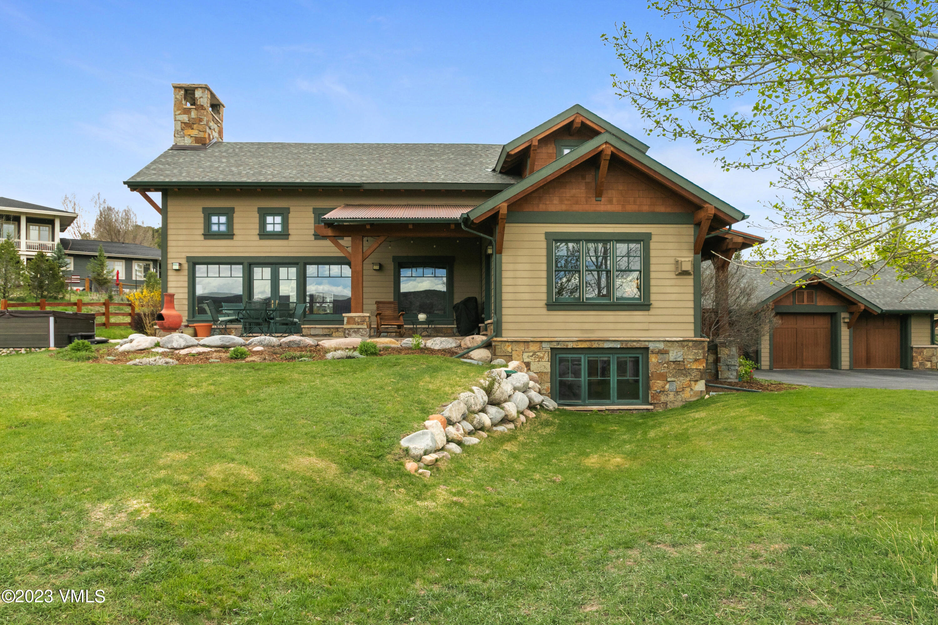 106 East Double Hitch Eagle, CO 81631 - Photo 24 of 28 a front view of a house with a yard