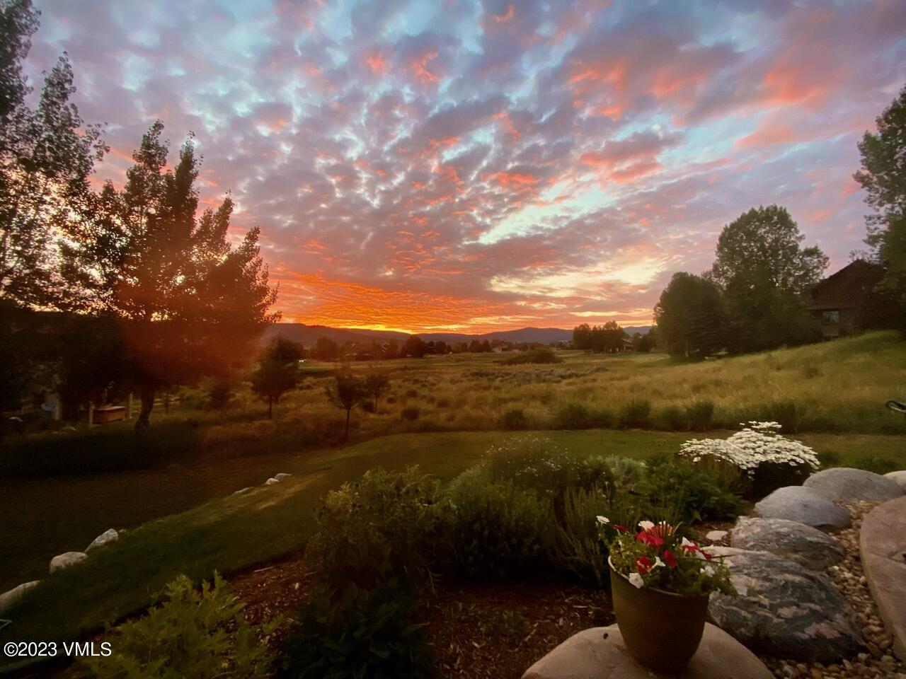 106 East Double Hitch Eagle, CO 81631 - Photo 25 of 28 a view of a lake with sitting area